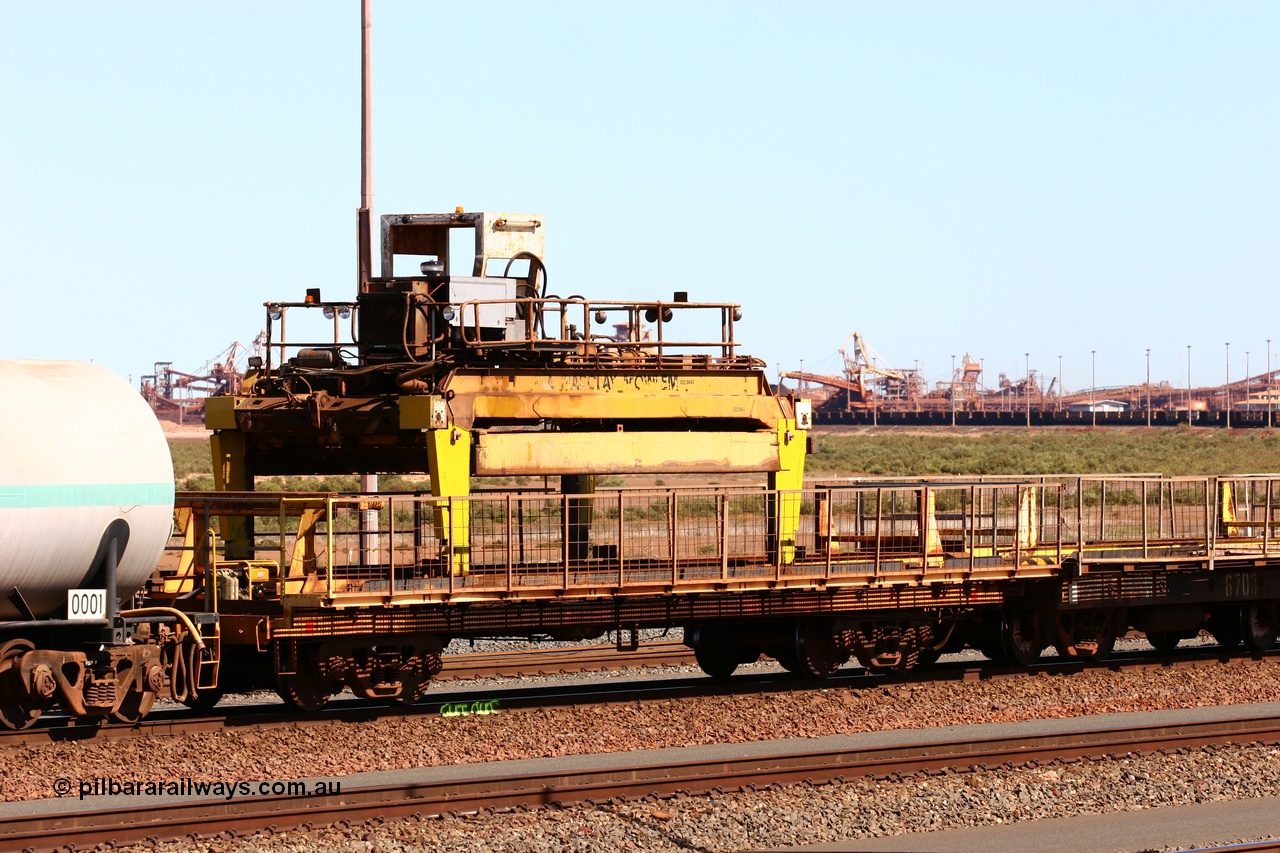 050724 4228
Nelson Point yard, flat waggon #6? in service on the Pony re-laying train as a transport waggon for a gantry car as pictured. Originally in service with Goldsworthy Mining as a BC or BCV box van, built by Comeng WA in 1966.
Keywords: Comeng-WA;GML;BHP-pony-waggon;