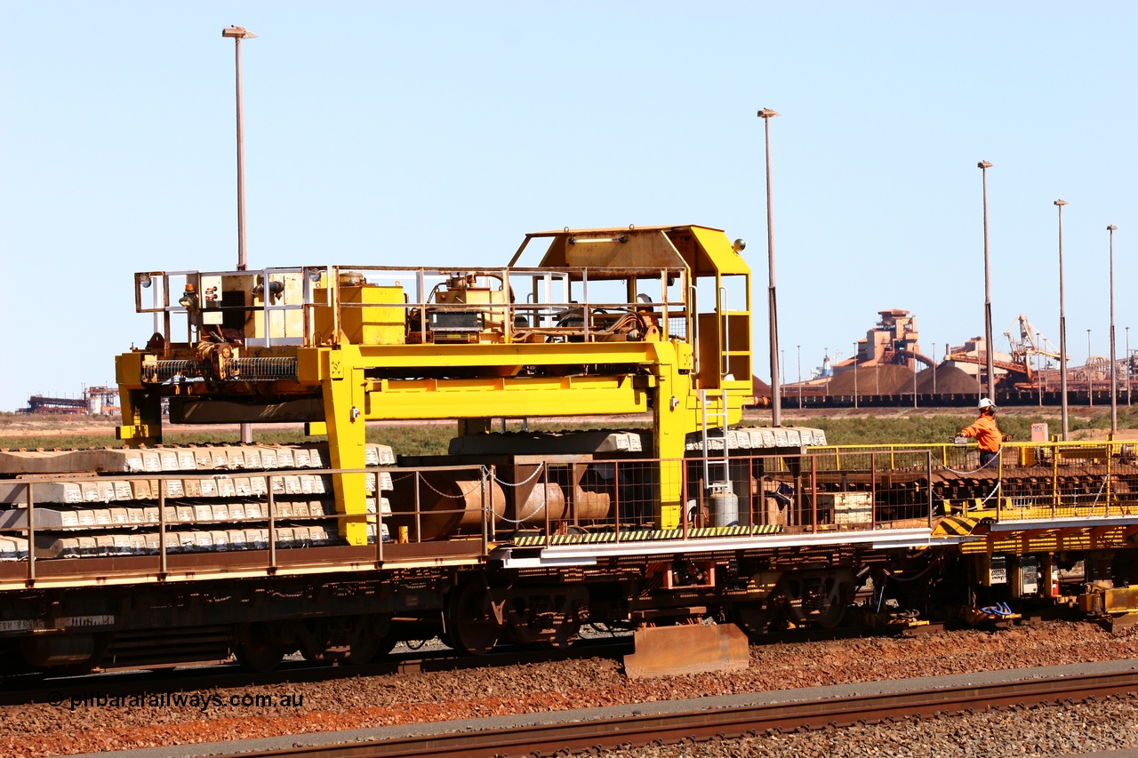 050724 4243
Nelson Point yard, flat waggons in service on the Pony re-laying train as transport waggons for sleepers, with a gantry car sitting atop a heavily modified and cut down Oroville waggon, with the left waggon a Scotts of Ipswich built flat waggon from in 1970 for then Mt Newman Mining Company.
Keywords: Scotts-Qld;BHP-pony-waggon;