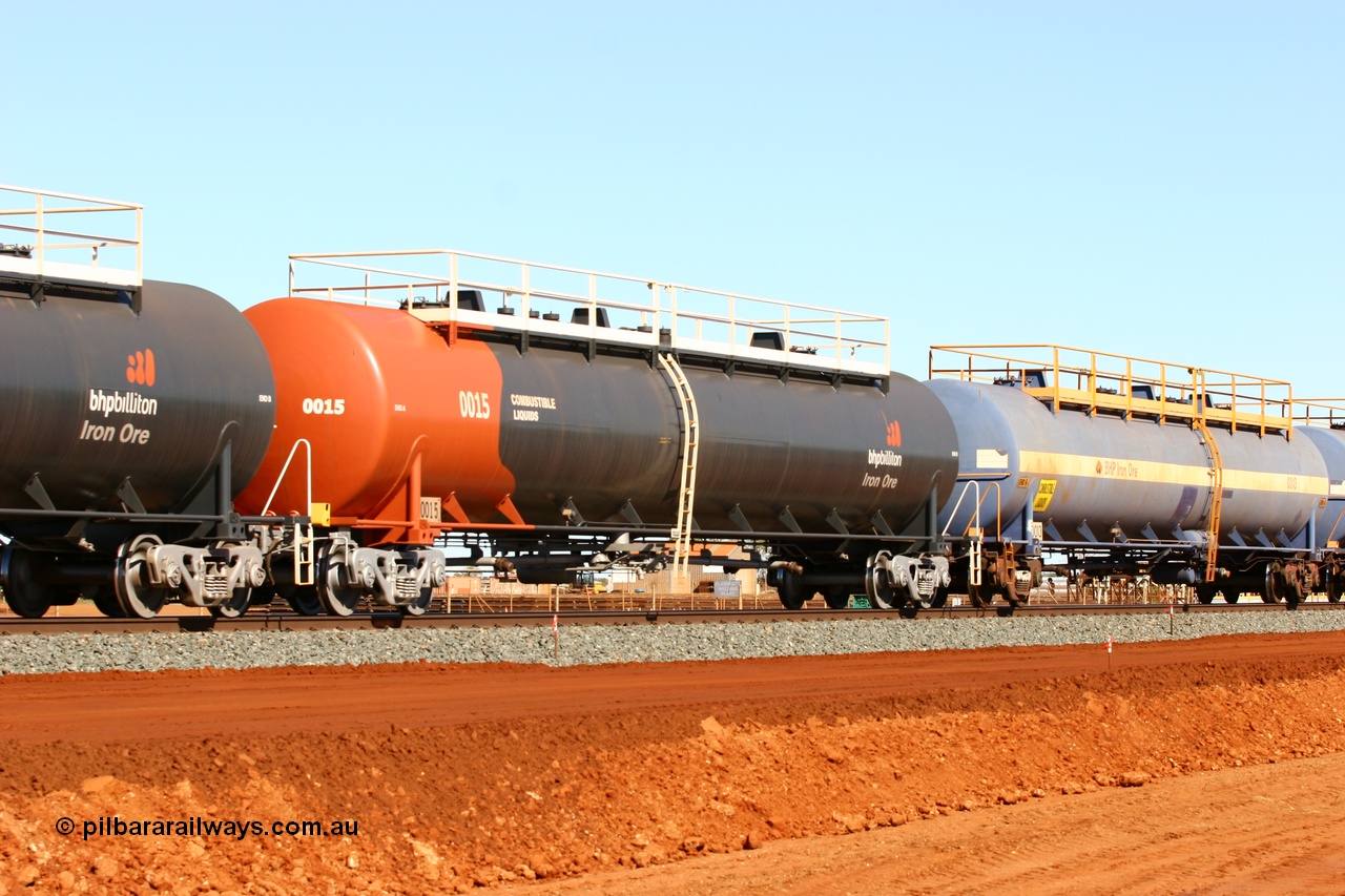 050724 4308
Bing Siding, empty fuel tank waggon 0015, a Comeng WA built 116 kilolitre tank waggon, one of a batch of six built in 1974-75 wearing the newer corporate 'Earth' livery of BHP Billiton Iron Ore.
Keywords: Comeng-WA;BHP-tank-waggon;