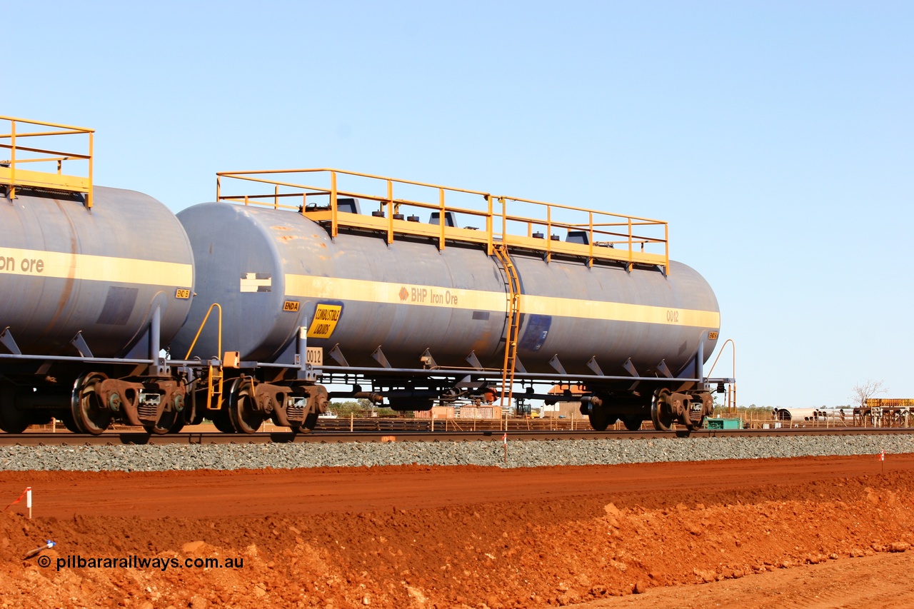 050724 4313
Bing Siding, empty 116 kL Comeng NSW built tank waggon 0012 from 1972, one of three such tank waggons.
Keywords: Comeng-NSW;BHP-tank-waggon;