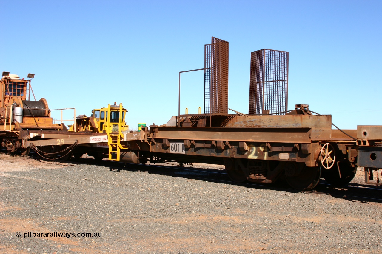 050801 4766
Flash Butt yard, rail recovery and transport train, 1st lead off waggon 6011, built by Scotts of Ipswich Qld on 04-09-1970, the mesh guarding is for the winch cable. The chute arrangement for the discharging and recovery of rail is visible.
Keywords: Scotts-Qld;BHP-rail-train;