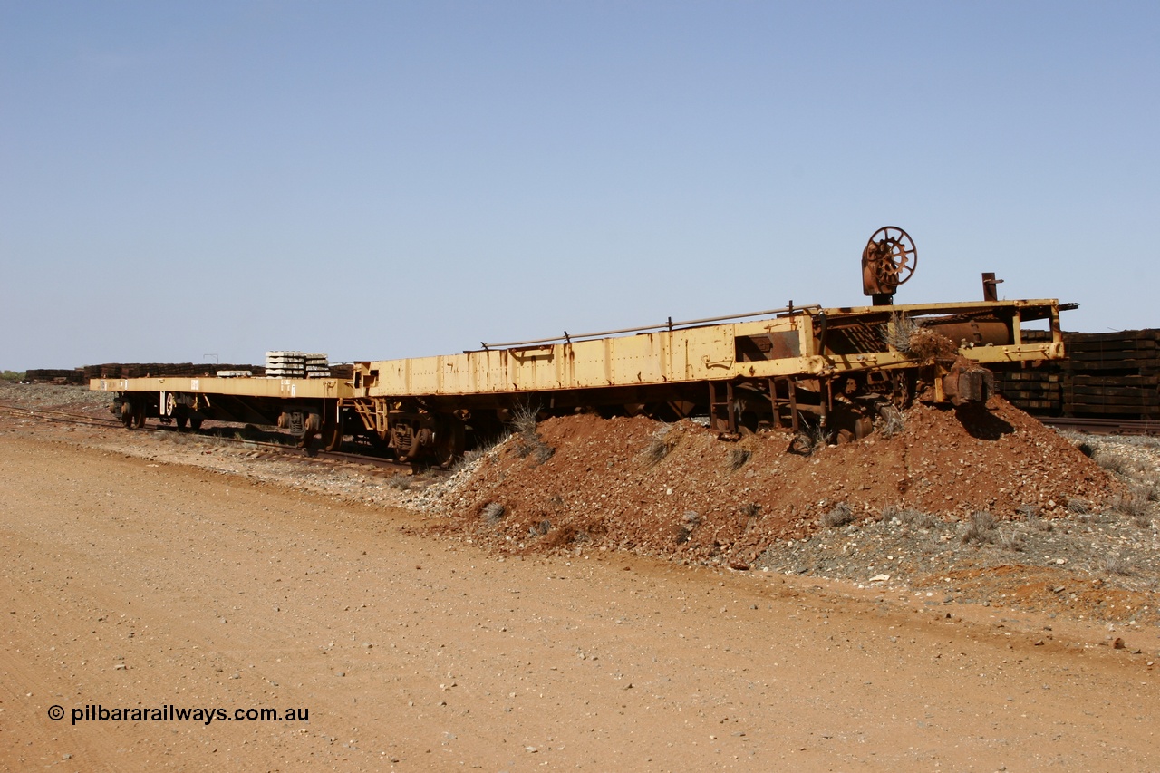 051001 5625
Flash Butt yard, heavily stripped down riveted waggon 206, possible original ballast waggon, number 206 was originally a waggon in the 'Camp Train' and appears to have USA origin, pushed into an earth bund.
Keywords: BHP-flat-waggon;