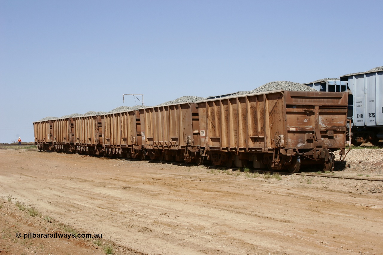 051001 5652
Flash Butt yard, rear of rake of Magor USA built ballast waggons, 534 is closest to camera.
Keywords: Magor-USA;BHP-ballast-waggon;