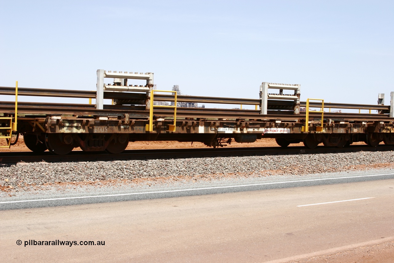 051001 5714
Boodarie, the Steel Train or rail recovery and transport train, flat waggon #24, 6005, a Scotts of Ipswich Qld built flat waggon from September 1970.
Keywords: Scotts-Qld;BHP-rail-train;