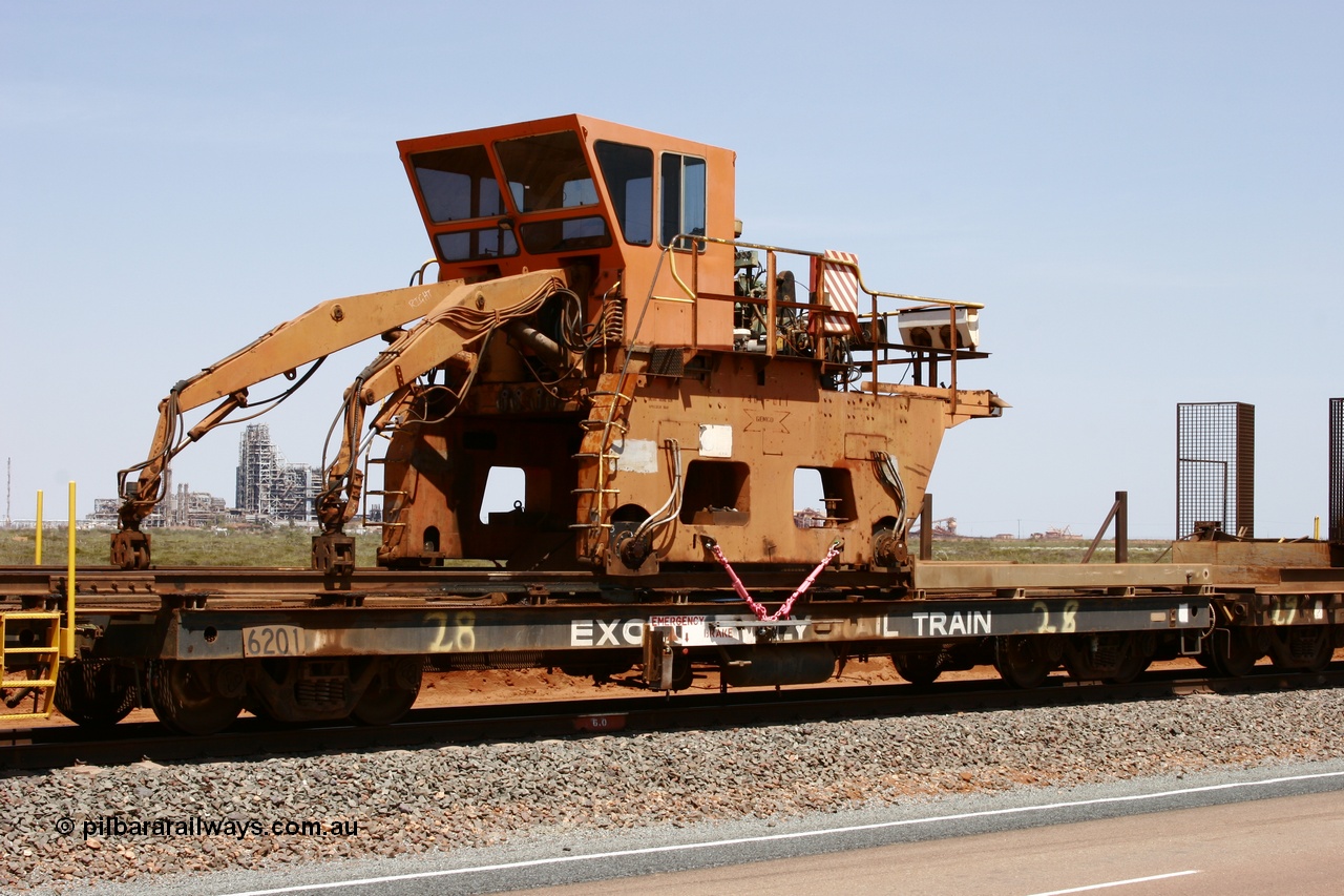 051001 5721
Boodarie, the Steel Train or rail recovery and transport train flat waggon #28, 2nd lead off waggon 6201, built by Comeng WA in January 1977 under order no. 07-M-282 RY, with the Gemco built straddle crane.
Keywords: Comeng-WA;BHP-rail-train;