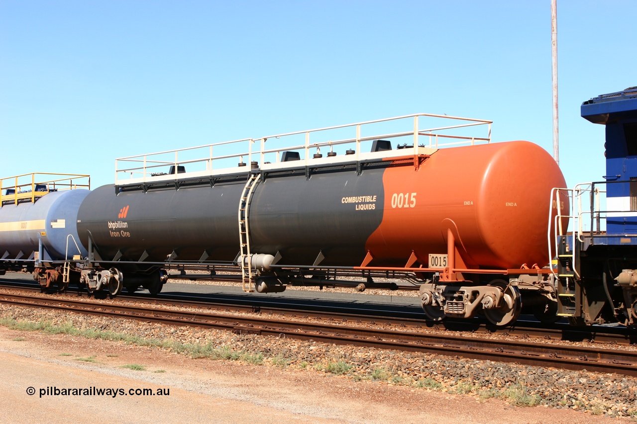 060414 3456
Nelson Point yard, empty fuel tank waggon 0015, a Comeng WA built 116 kilolitre tank waggon, one of a batch of six built in 1974-75 wearing the newer corporate 'Earth' livery of BHP Billiton Iron Ore.
Keywords: Comeng-WA;BHP-tank-waggon;
