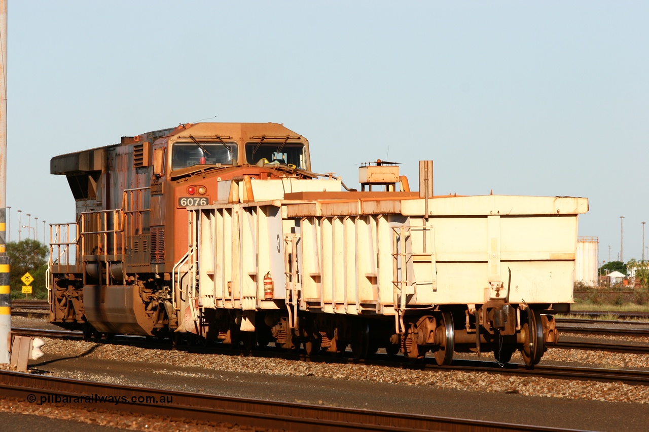 060414 3467
Nelson Point yard, compressor set no. 3, consisting of a weighted 'ballast' waggon closest to camera and the compressor car. Modified from former ore waggons and used on the end of rakes to keep the brakes of as they are run through the dumpers.
