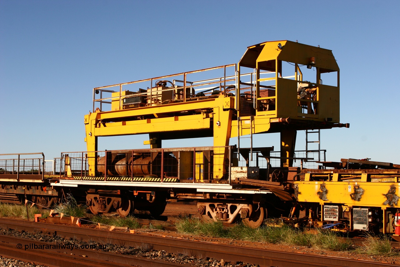 060429 3725
Flash Butt yard, Pony waggon #1, modified from a Magor USA built Oroville ore waggon, with a Comeng built gantry carrier.
Keywords: BHP-pony-waggon;Magor-USA;