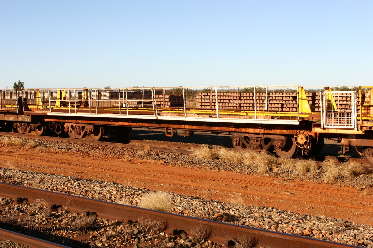 060429 3744
Flash Butt yard, Pony re-laying flat waggon, in service as a transport waggon for a gantry car and sleepers. Originally in service with Goldsworthy Mining as a BC or BCV box van, built by Comeng WA in 1966.
Keywords: Comeng-WA;GML;BHP-pony-waggon;