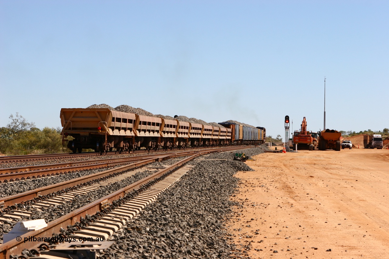 060501 3903
Tabba Siding, a string of Difco side dumps on the rear of a loaded ballast train.
Keywords: Difco-Ohio-USA;GML;BHP-ballast-waggon;