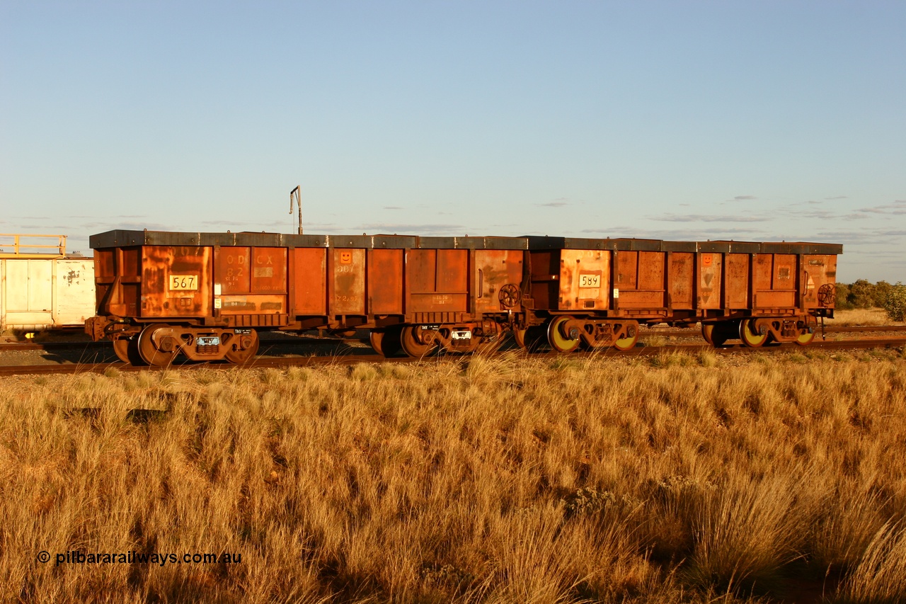 060618 6219
Flash Butt yard, modified original Magor USA built Oroville waggons 567 and 589, cut down and covered for use as indexing waggons at Finucane Island car dumpers, note the original ODCX marking visible.
Keywords: Magor-USA;Oroville;BHP-index-waggon;