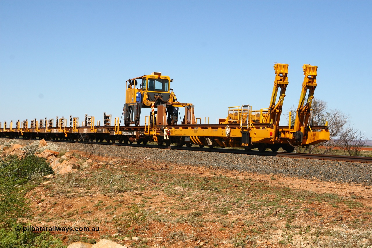 080621 2724
Tabba South, view from rear of new Lead-Off Lead-On waggon STTR class STTR 6214 on the end of the Steel Train or rail recovery and transport train, built by Gemco Rail WA, the chutes can be seen standing up with the squeeze rollers behind the mesh.
Keywords: Gemco-Rail-WA;BHP-rail-train;STTR-type;STTR6214;