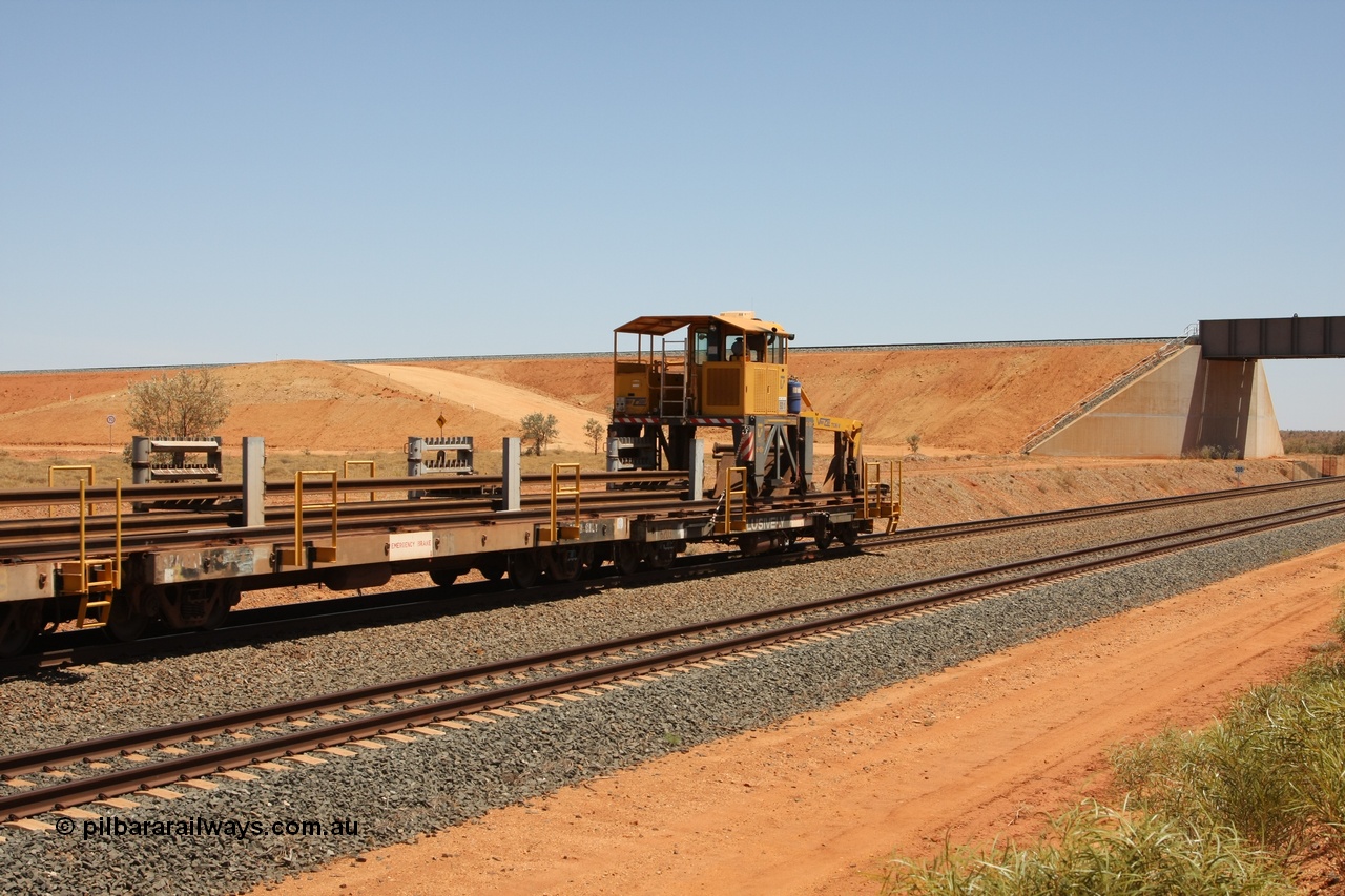 081217 0454
Woodstock Siding, one of a batch of six flat waggons converted by Mt Newman Mining workshops by cutting down a pair of ore waggons to make one flat waggon, 6105 in service with the rail recovery and transport train as waggon #2.
Keywords: Mt-Newman-Mining-WS;BHP-rail-train;