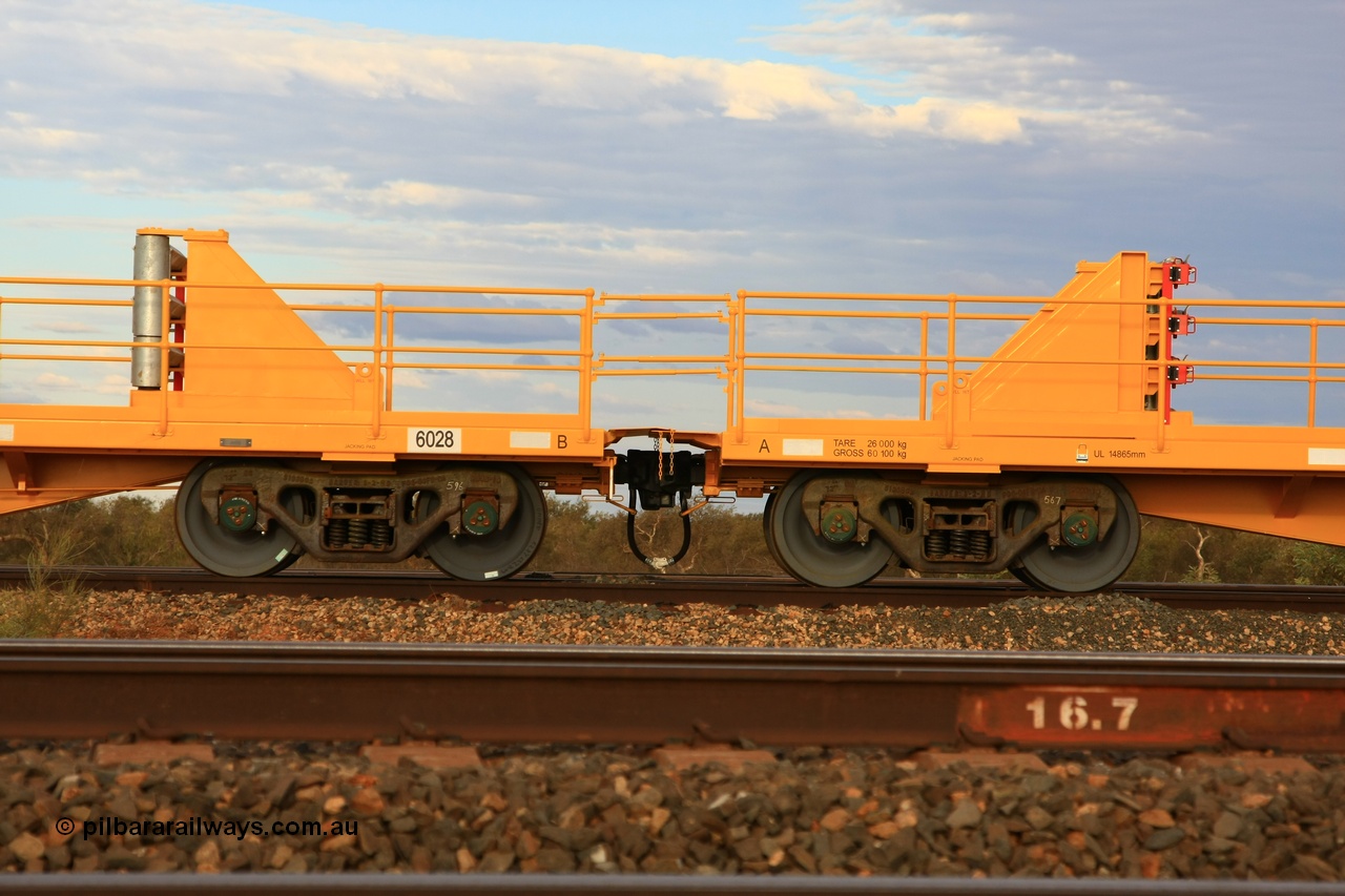 100717 0659
Flash Butt yard, new rail stock carrier waggon 6028, built by Gemco Rail in late 2009-10 with Barber bogies.
Keywords: Gemco-Rail-WA;BHP-rail-train;