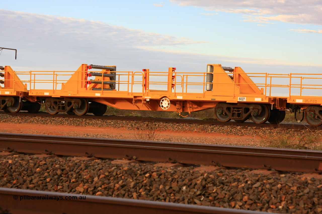 100717 0696
Flash Butt yard, new rail stock carrier waggon 6027, built by Gemco Rail in late 2009-10 with Barber bogies.
Keywords: Gemco-Rail-WA;BHP-rail-train;