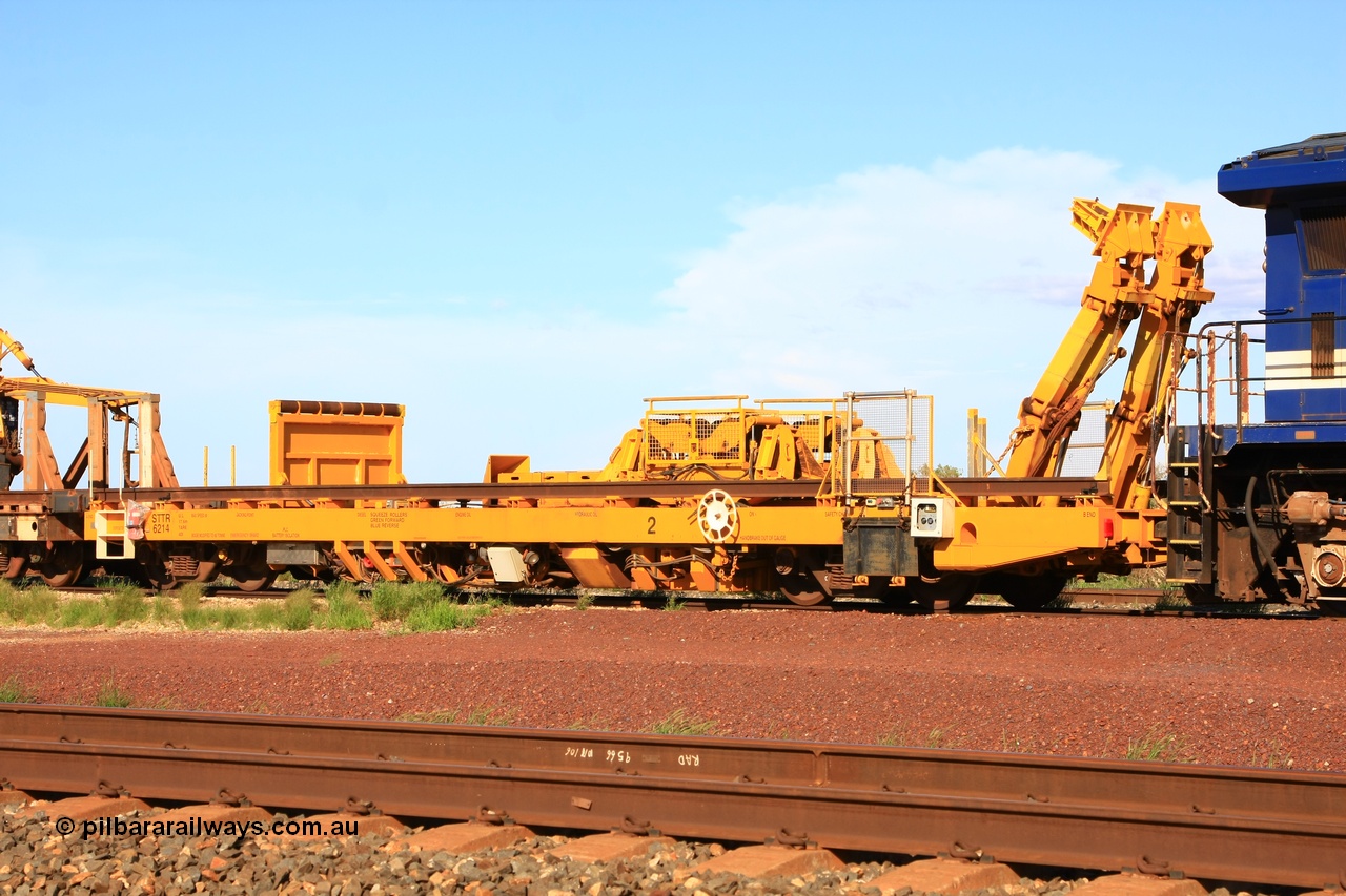 110208 9425
Flash Butt yard, new Lead-Off Lead-On waggon STTR class STTR 6214 on the end of the Steel Train or rail recovery and transport train, built by Gemco Rail WA, the chutes can be seen standing up with the squeeze rollers behind the mesh.
Keywords: Gemco-Rail-WA;BHP-rail-train;STTR-type;STTR6214;