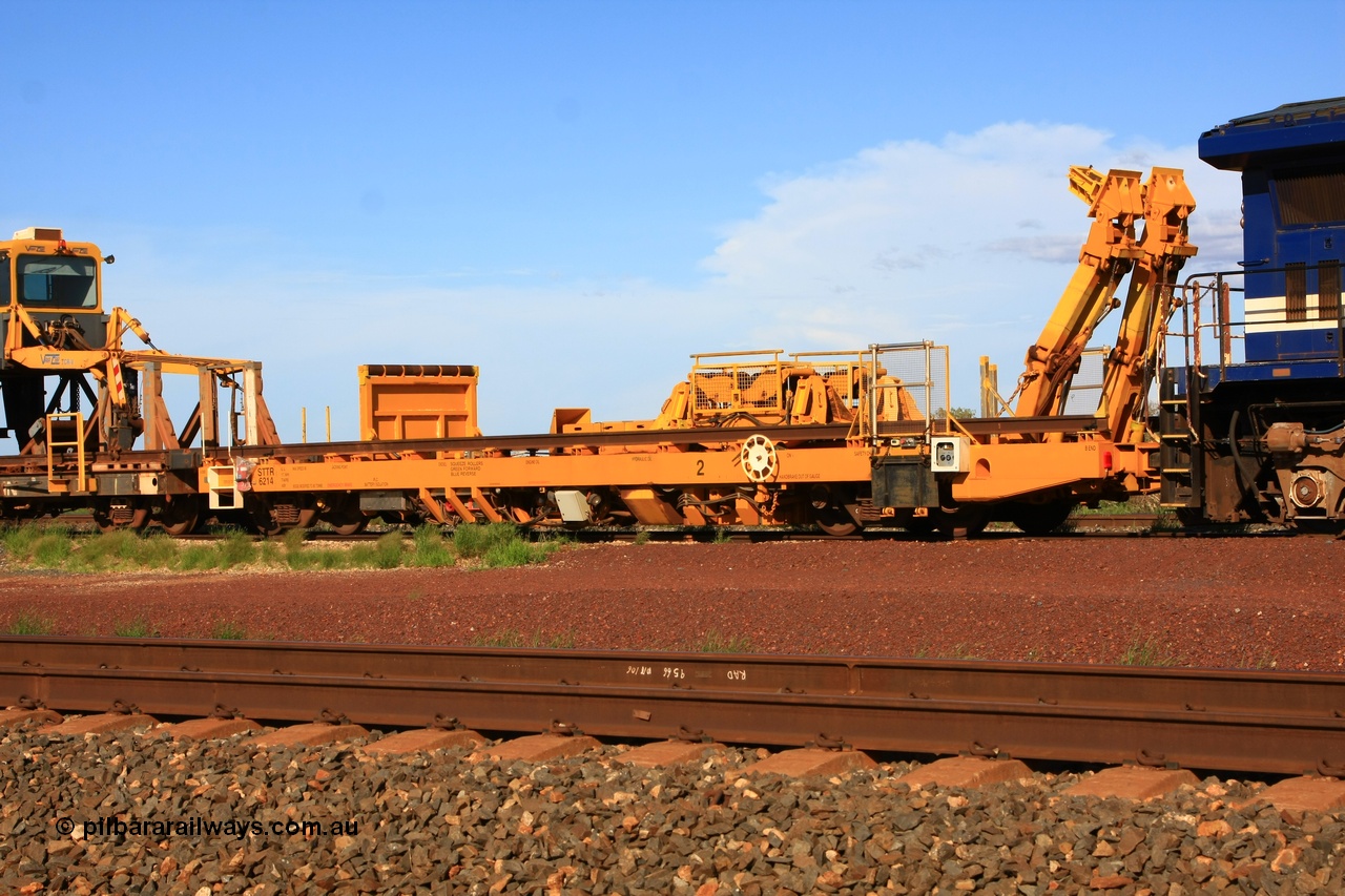 110208 9429
Flash Butt yard, new Lead-Off Lead-On waggon STTR class STTR 6214 on the end of the Steel Train or rail recovery and transport train, built by Gemco Rail WA, the chutes can be seen standing up with the squeeze rollers behind the mesh.
Keywords: Gemco-Rail-WA;BHP-rail-train;STTR-type;STTR6214;