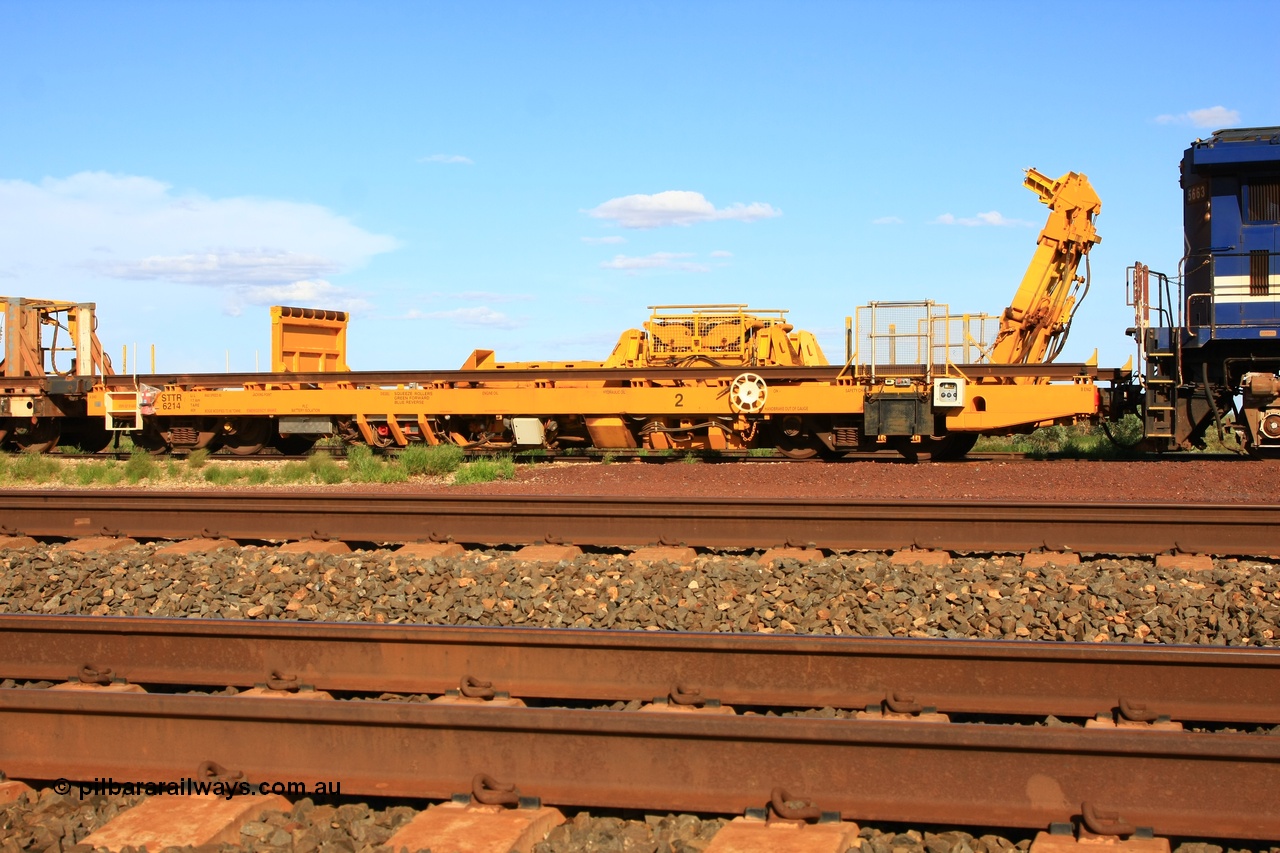 110208 9430
Flash Butt yard, new Lead-Off Lead-On waggon STTR class STTR 6214 on the end of the Steel Train or rail recovery and transport train, built by Gemco Rail WA, the chutes can be seen standing up with the squeeze rollers behind the mesh.
Keywords: Gemco-Rail-WA;BHP-rail-train;STTR-type;STTR6214;