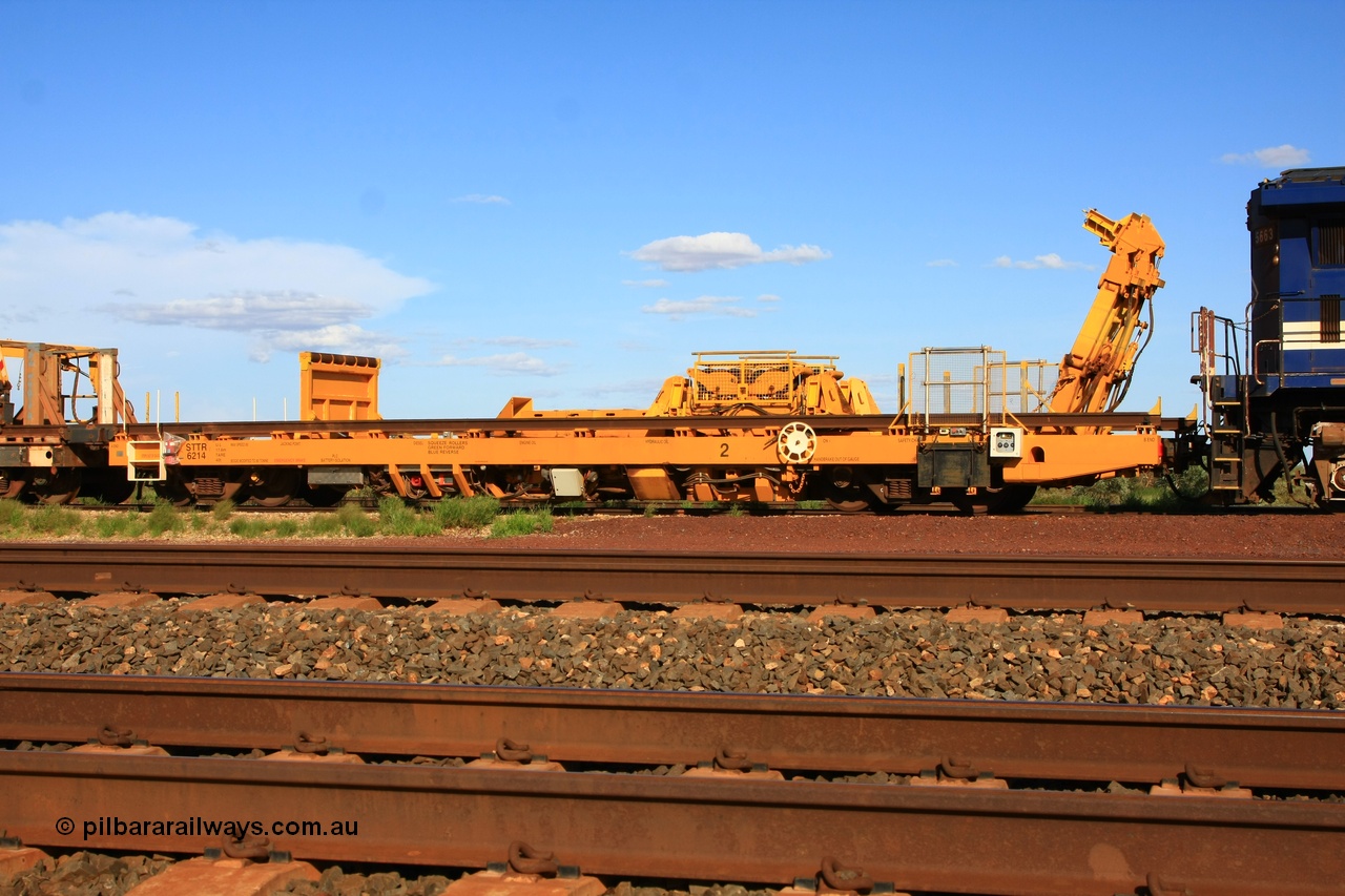 110208 9431
Flash Butt yard, new Lead-Off Lead-On waggon STTR class STTR 6214 on the end of the Steel Train or rail recovery and transport train, built by Gemco Rail WA, the chutes can be seen standing up with the squeeze rollers behind the mesh.
Keywords: Gemco-Rail-WA;BHP-rail-train;STTR-type;STTR6214;