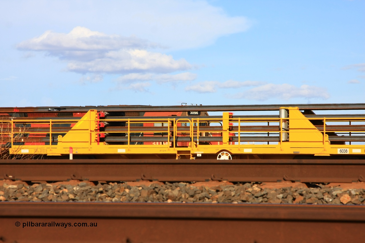 110208 9444
Flash Butt yard, new rail stock carrier waggon 6038 loaded with strings of rail, built by Gemco Rail in late 2009-10 with Barber bogies.
Keywords: BHP-rail-train;Gemco-Rail-WA;