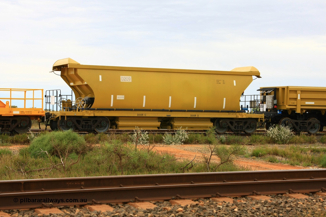 110606 1749
Flash Butt, CNR-QRRS of China built 99 tonne ballast waggon 0209 waits to be loaded.
Keywords: CNR-QRRS-China;BHP-ballast-waggon;