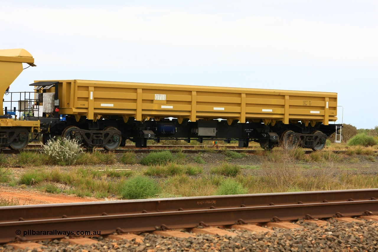 110606 1750
Flash Butt yard, CNR-QRRS of China built side dump waggon, built and delivered in early 2011, waggon 0711 awaits the call to duty.
Keywords: CNR-QRRS-China;BHP-ballast-waggon;