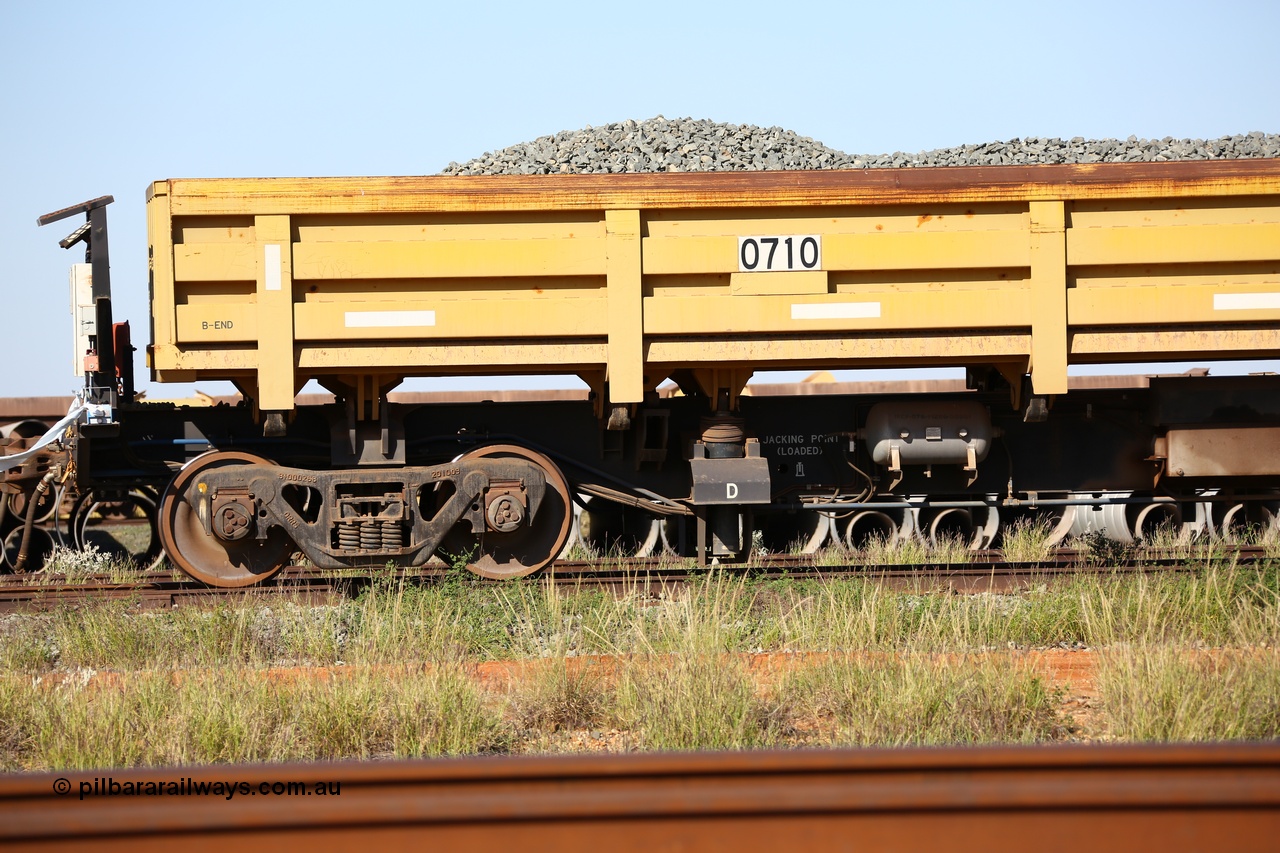 150619 9083
Flash Butt yard, CNR-QRRS of China built side dump waggons, built and delivered around 2011-12, waggon 0710 loaded with fines for sheeting, B end and bogie detail.
Keywords: CNR-QRRS-China;BHP-ballast-waggon;