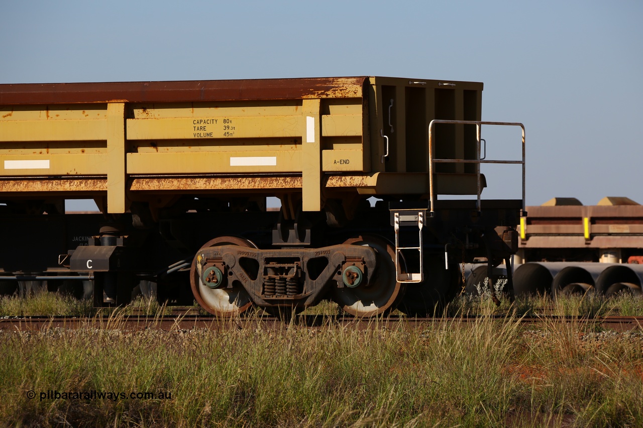 150619 9101
Flash Butt yard, CNR-QRRS of China built side dump waggons, built and delivered around 2011-12, waggon 0713 loaded with fines for sheeting, A end and bogie detail.
Keywords: CNR-QRRS-China;BHP-ballast-waggon;