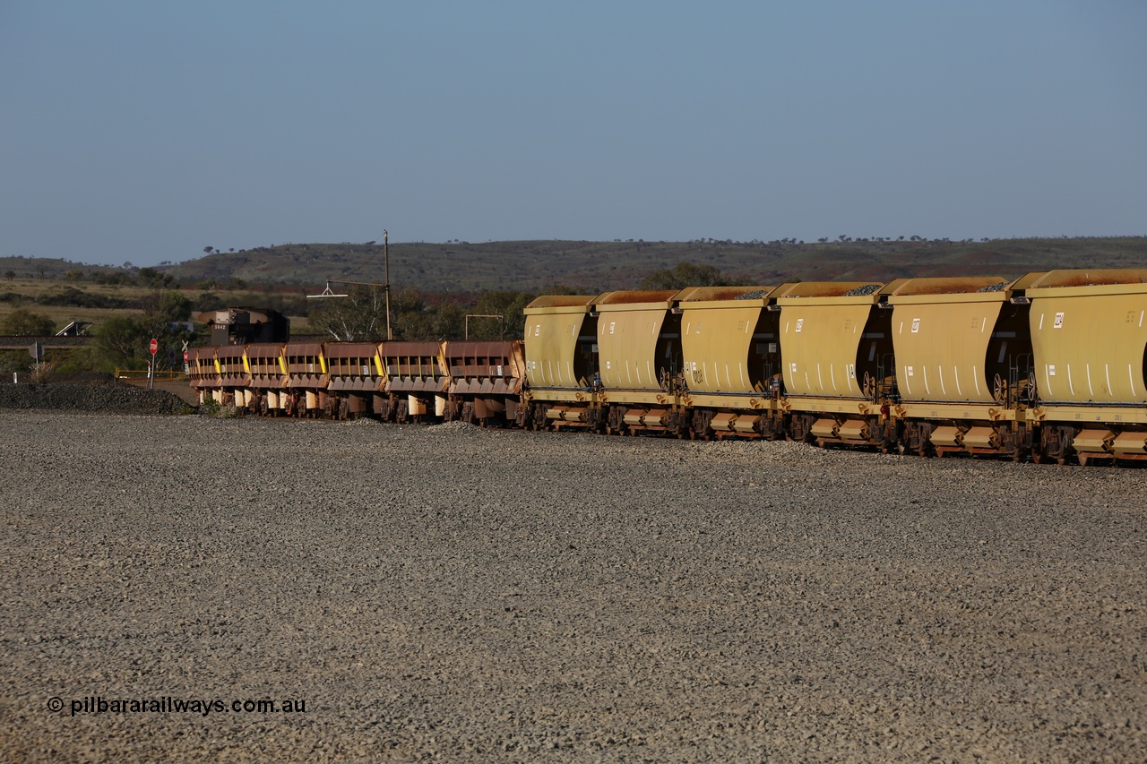 150620 9329
Quarry 8 ballast loading area, rake of CNR-QRRS of China built 99 tonne ballast waggons with the Difco USA built long and short side dump waggons with a Dash 8 loco on the rear.
Keywords: CNR-QRRS-China;BHP-ballast-waggon;Difco-Ohio-USA;