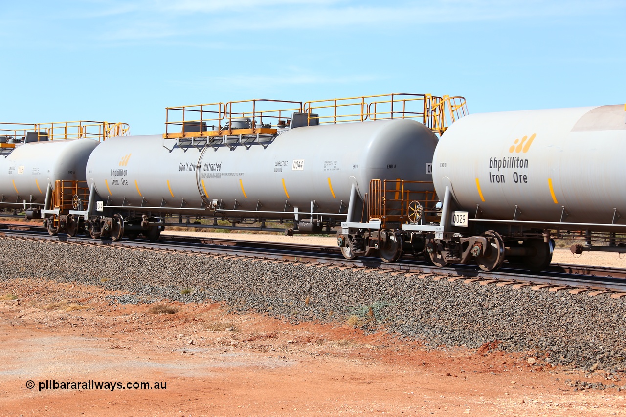160128 00331
Mooka Siding, empty 116 kL CNR-QRRS of China built tank waggon 0044, one of a second batch delivered in 2015 with safety slogan 'Don't drive distracted'.
Keywords: CNR-QRRS-China;BHP-tank-waggon;