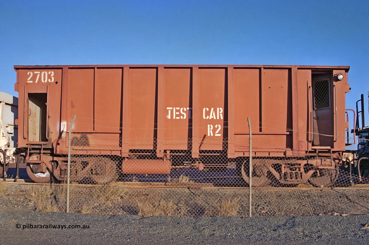 2703 Mt Newman Mining Workshops 257-17
Flash Butt yard, view of Rail Dynamics Laboratory test waggon 2703, modified by Mt Newman Mining Workshops from waggon number 2716 in 1975, originally a Comeng built waggon dating from 1971.
Keywords: Comeng-WA;BHP-Comeng-Ore-Waggon;BHP-Service-Waggon;