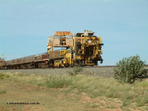 Pony Harsco 040502 085622
Mooka Siding, trailing view of the 'Pony' heading south, with the Harsco Pony track re-laying machine on the rear.
Keywords: Harsco;BHP-pony-waggon;Pony-Track-Relayer;