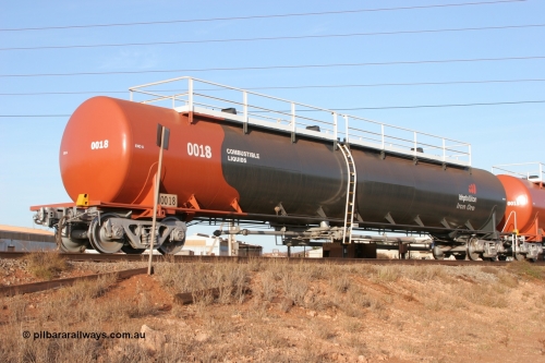 0018 Comeng WA 050410 0536
Nelson Point, tanker filling area, fuel tank waggon 0018, a Comeng WA built 114 kilolitre tank waggon, one of a batch of three built in 1974-75 wearing the newer corporate 'Earth' livery of BHP Billiton Iron Ore.
Keywords: Comeng-WA;BHP-tank-waggon;
