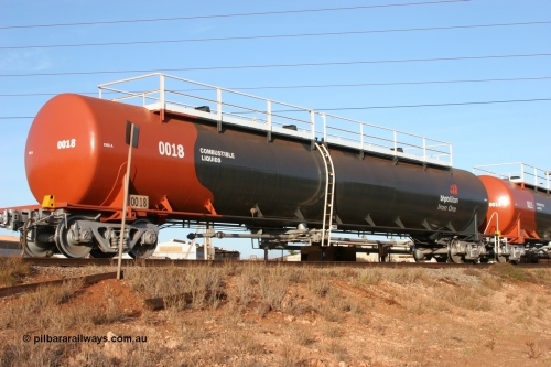 0018 Comeng WA 050410 0537
Nelson Point, tanker filling area, fuel tank waggon 0018, a Comeng WA built 114 kilolitre tank waggon, one of a batch of three built in 1974-75 wearing the newer corporate 'Earth' livery of BHP Billiton Iron Ore.
Keywords: Comeng-WA;BHP-tank-waggon;