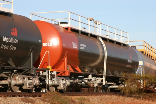 0015 Comeng NSW 050410 0540
Nelson Point, tanker filling area, fuel tank waggon 0015, a Comeng NSW built 112 kilolitre tank waggon, one of a batch of four built in 1972 wearing the newer corporate 'Earth' livery of BHP Billiton Iron Ore.
Keywords: Comeng-WA;BHP-tank-waggon;