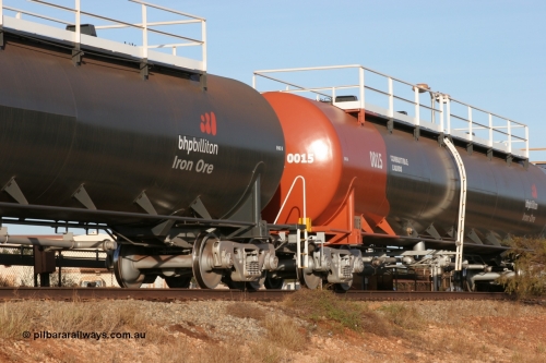 0015 Comeng NSW 050410 0542
Nelson Point, tanker filling area, fuel tank waggon 0015, a Comeng NSW built 112 kilolitre tank waggon, one of a batch of four built in 1972 wearing the newer corporate 'Earth' livery of BHP Billiton Iron Ore.
Keywords: Comeng-WA;BHP-tank-waggon;