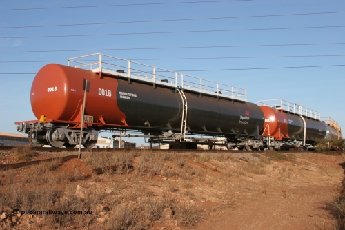 0018 Comeng WA 050410 0545
Nelson Point, tanker filling area, fuel tank waggons 0018 a Comeng WA built 114 kilolitre tank waggon, one of a batch of three built in 1974-75 and 0015 a Comeng NSW built 112 kilolitre tank waggon, one of a batch of four built in 1972 and both wearing the newer corporate 'Earth' livery of BHP Billiton Iron Ore.
Keywords: Comeng-WA;BHP-tank-waggon;