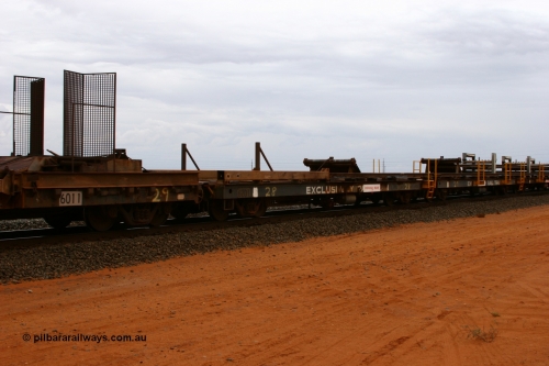 6201 Comeng WA 050522 2738
Goldsworthy Junction, rail recovery and transport train flat waggon #28, second lead in waggon 6201, built by Comeng WA in January 1977 under order number 07-M-282 RY, the mesh guarding is for the winch cable. The chute arrangement for the discharging and recovery of rail is visible.
Keywords: Comeng-WA;BHP-rail-train;