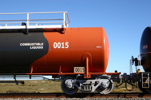 0015 Comeng WA 050704 3981
Bing Siding, empty 116 kL Comeng WA built tank waggon 0015 from 1974-5, one of six such tank waggons, detail of the A end and bogie, wearing the BHP Billiton Earth livery.
Keywords: Comeng-WA;BHP-tank-waggon;