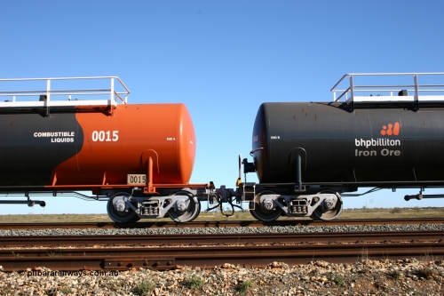 0015 Comeng WA 050704 3982
Bing Siding, empty 116 kL Comeng WA built tank waggon 0015 from 1974-5, one of six such tank waggons, detail of the A end and bogie and the B end of 0018, both wearing the BHP Billiton Earth livery.
Keywords: Comeng-WA;BHP-tank-waggon;