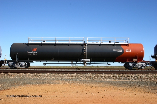 0015 Comeng WA 050704 3985
Bing Siding, empty 116 kL Comeng WA built tank waggon 0015 from 1974-5, one of six such tank waggons, wearing the BHP Billiton Earth livery.
Keywords: Comeng-WA;BHP-tank-waggon;