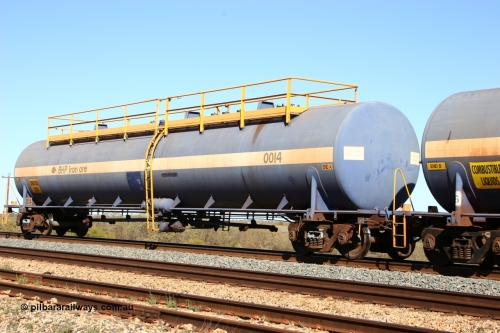 0014 Comeng WA 050704 3992
Bing Siding, empty 116 kL Comeng WA built tank waggon 0014 from 1974-5, one of six such tank waggons.
Keywords: Comeng-WA;BHP-tank-waggon;