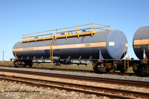 0014 Comeng WA 050704 3993
Bing Siding, empty 116 kL Comeng WA built tank waggon 0014 from 1974-5, one of six such tank waggons.
Keywords: Comeng-WA;BHP-tank-waggon;