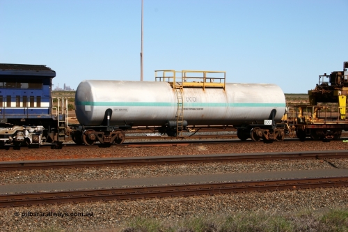 0001 Comeng NSW 050724 4209
Nelson Point yard, Comeng NSW built 82 kilolitre water tank waggon 0001, one of two such tank waggons built in November 1970, attached to the Pony as they relay a road in the yard.
Keywords: Comeng-NSW;BHP-tank-waggon;
