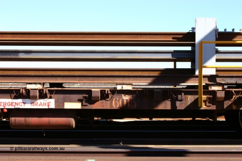 6015 Comeng WA 050801 4772
Flash Butt yard, rail recovery and transport train flat waggon #26, 6015, built by Comeng WA in November 1971, view of original style number.
Keywords: Comeng-WA;BHP-rail-train;