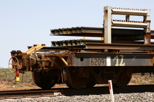 6209 Comeng WA 051001 5686
Boodarie, the Steel Train or rail recovery and transport train, hand brake end of waggon #12, 6209, a Comeng WA built flat waggon from January 1977 under order no. 07-M-282 RY.
Keywords: Comeng-WA;BHP-rail-train;