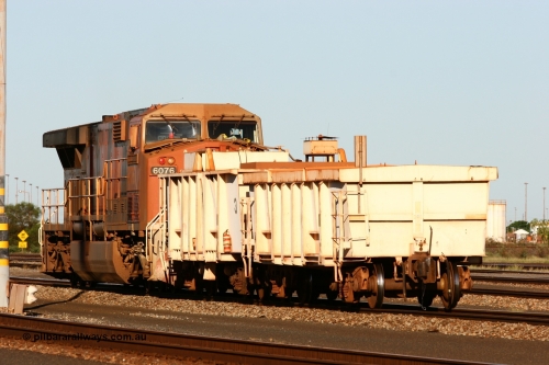 CC3 060414 3467
Nelson Point yard, compressor waggon set No. 3, consisting of a weighted 'ballast' waggon closest to camera and the compressor car. Modified from former original Magor USA build ore waggons 673 and 683 and used on the end of rakes to keep the brakes of as they are run through the dumpers.
Keywords: Magor-USA;BHP-compressor-set;