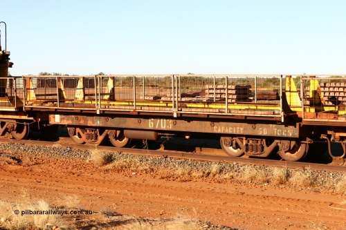 6703 Mt Newman Mining Workshops 060429 3745
Flash Butt yard, Pony re-laying waggon 6703 is a heavily cut down and modified Magor USA ore waggon done by Mt Newman Mining workshops, converted to a 50 tonne flat waggon.
Keywords: BHP-pony-waggon;Magor-USA;Mt-Newman-Mining-WS;