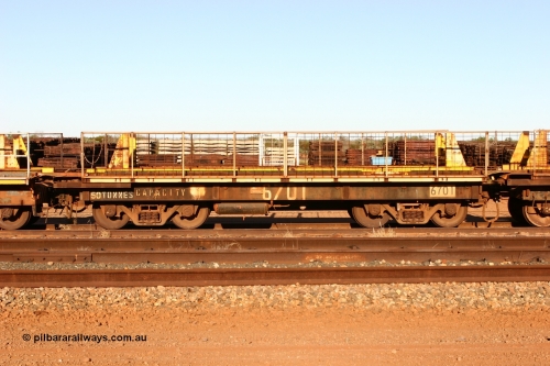 6702 Mt Newman Mining Workshops 060429 3752
Flash Butt yard, Pony re-laying waggon 6702 is a heavily cut down and modified Magor USA ore waggon done by Mt Newman Mining workshops, converted to a 50 tonne flat waggon.
Keywords: BHP-pony-waggon;Magor-USA;Mt-Newman-Mining-WS;