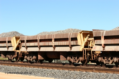 8702 Difco USA 060501 3877
Tabba Siding, originally built by Difco USA for Goldsworthy Mining Ltd in 1967 as a batch of five, prefixed with 870 in BHP service, 8702 side dump waggon loaded with ballast.
Keywords: Difco-Ohio-USA;GML;BHP-ballast-waggon;